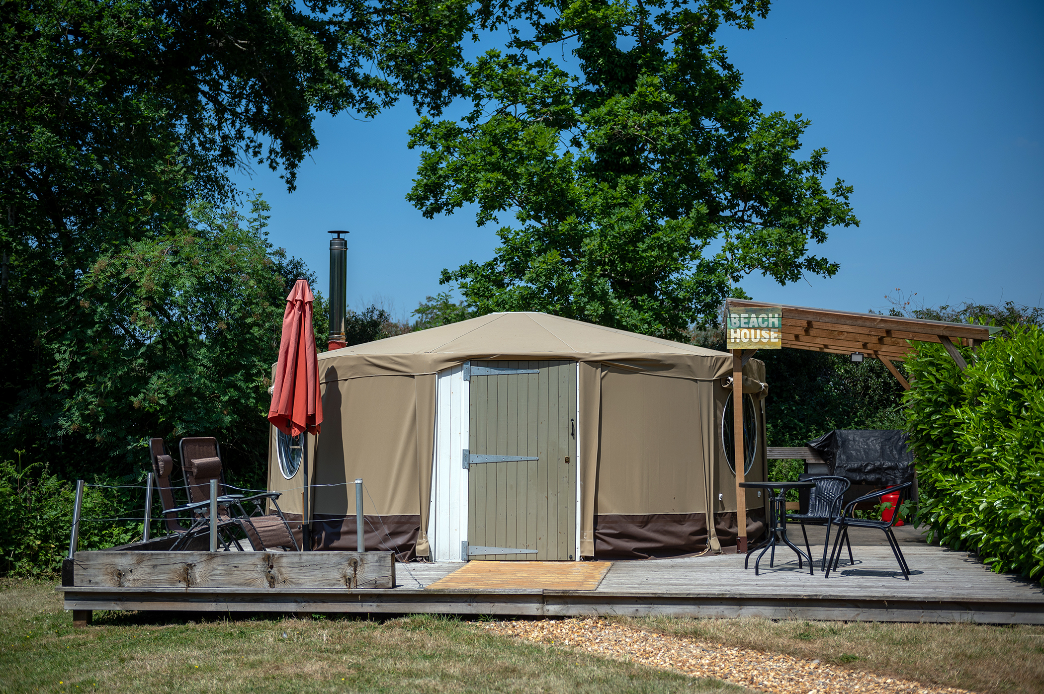 Yurt at Back of Beyond Touring, Camping & Glamping Park on a summer's day
